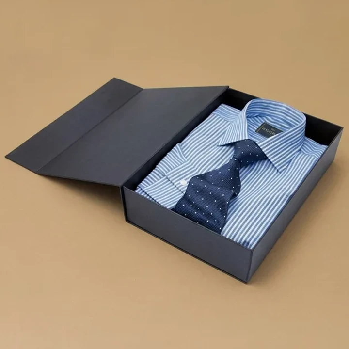 Rigid apparel box with neatly folded clothing