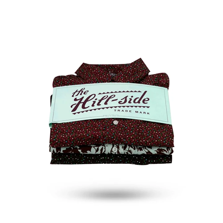 Folded apparel in printed sleeve packaging