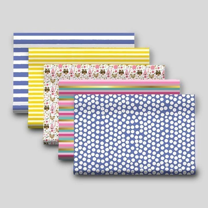 Folded gift wrapping paper sheets