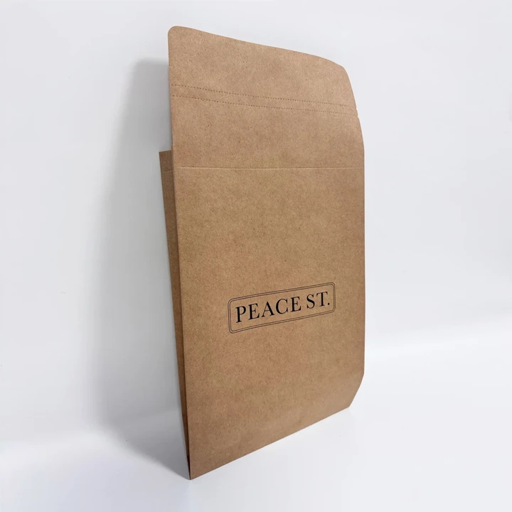 Kraft mailer holding folded clothing