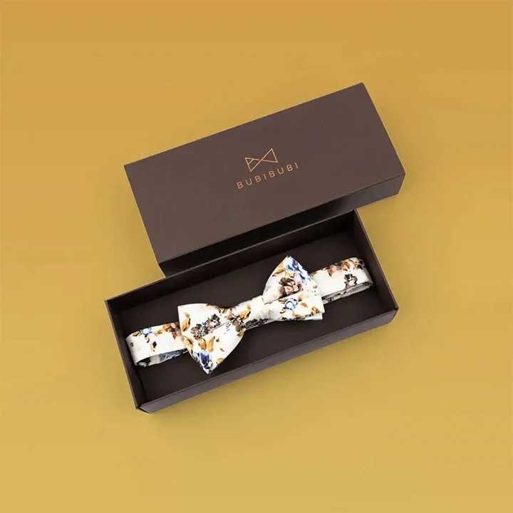 Clothing gift box with ribbon tie closure