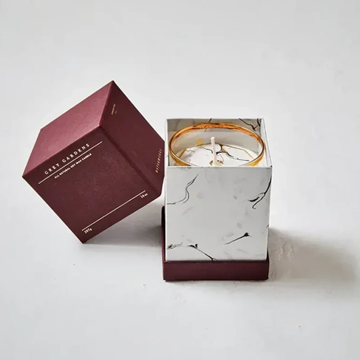 Rigid candle box with fitted protective insert