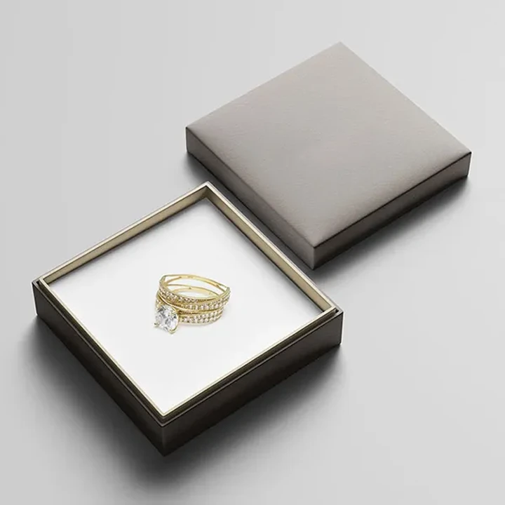 Rigid jewelry box with fitted soft insert