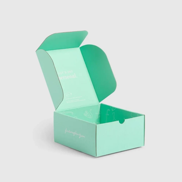 Roll end box with tuck top closure