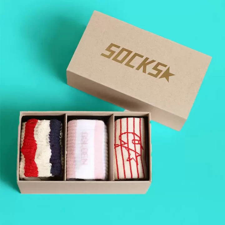 Rolled socks arranged in compact box