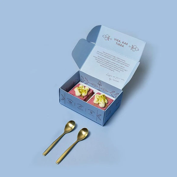 Small white treat box with folding lid