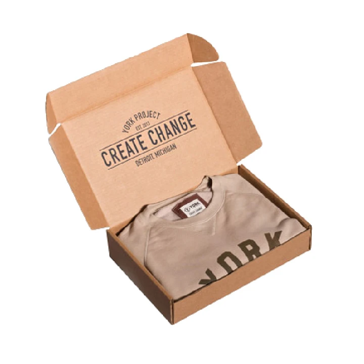Folded t-shirts in printed packaging box