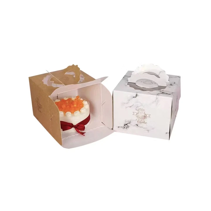 Stacked white cake boxes for tiers